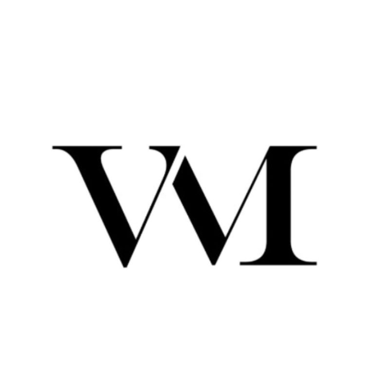 Logo stylisé avec les lettres "V" et "M" en noir sur fond blanc.