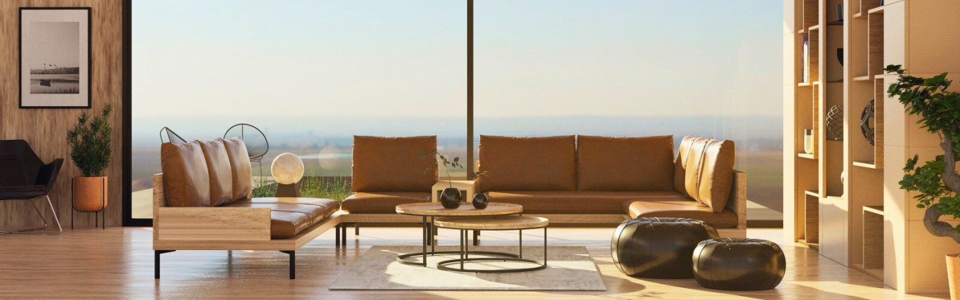 Salon moderne avec canapé en cuir, table basse et vue panoramique sur le paysage.
